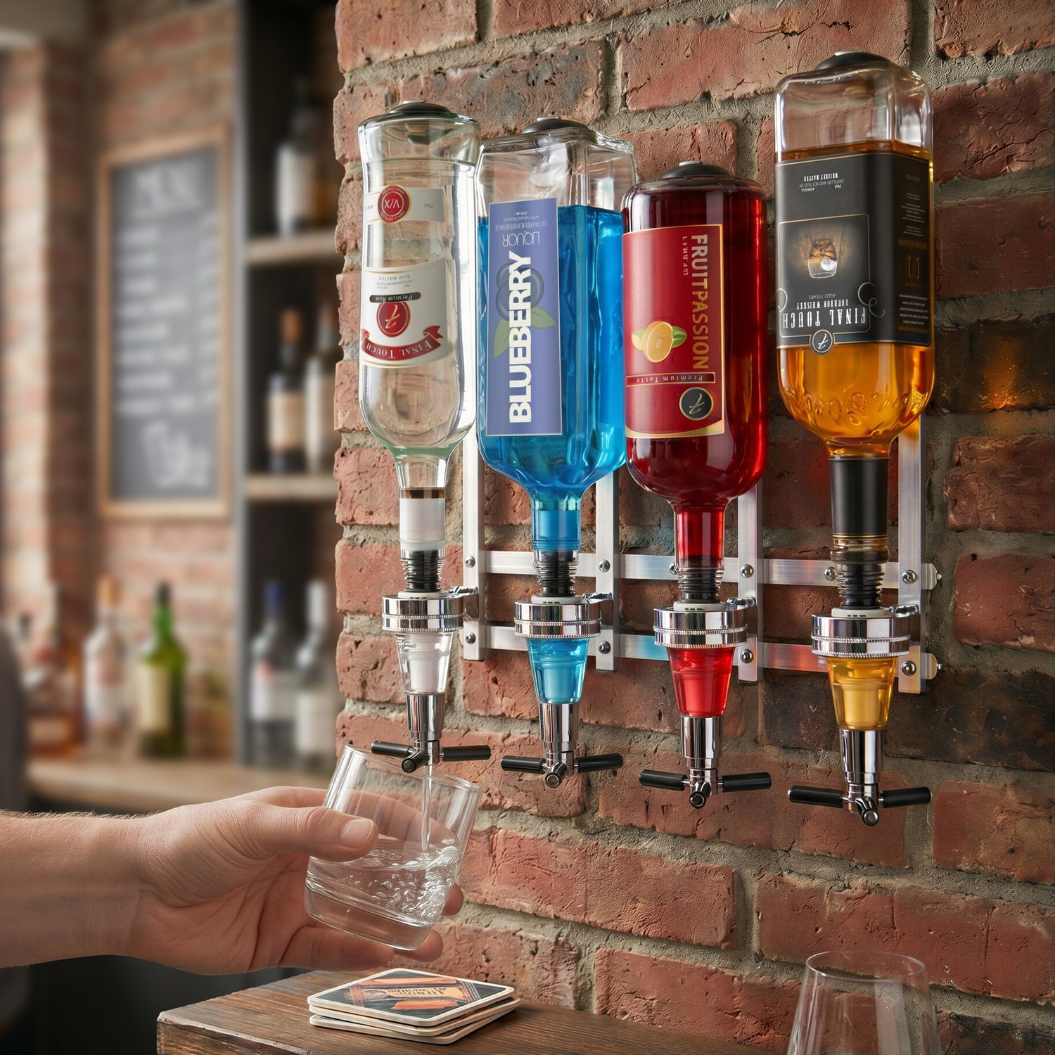 4-bottle wall-mounted bar drink dispenser with optics, pouring a drink into a glass tumbler in a home bar setting.