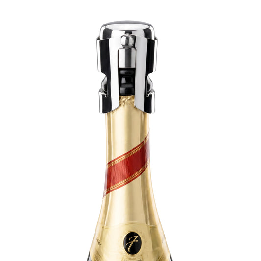 Chrome champagne stopper clips onto bottle for freshness and longer storage.
